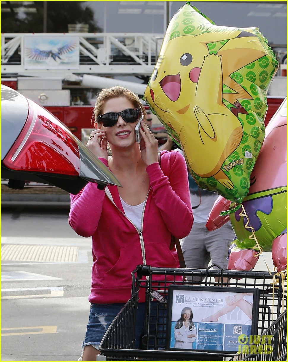 ashley greene leaves store with balloons party supplies 072988468