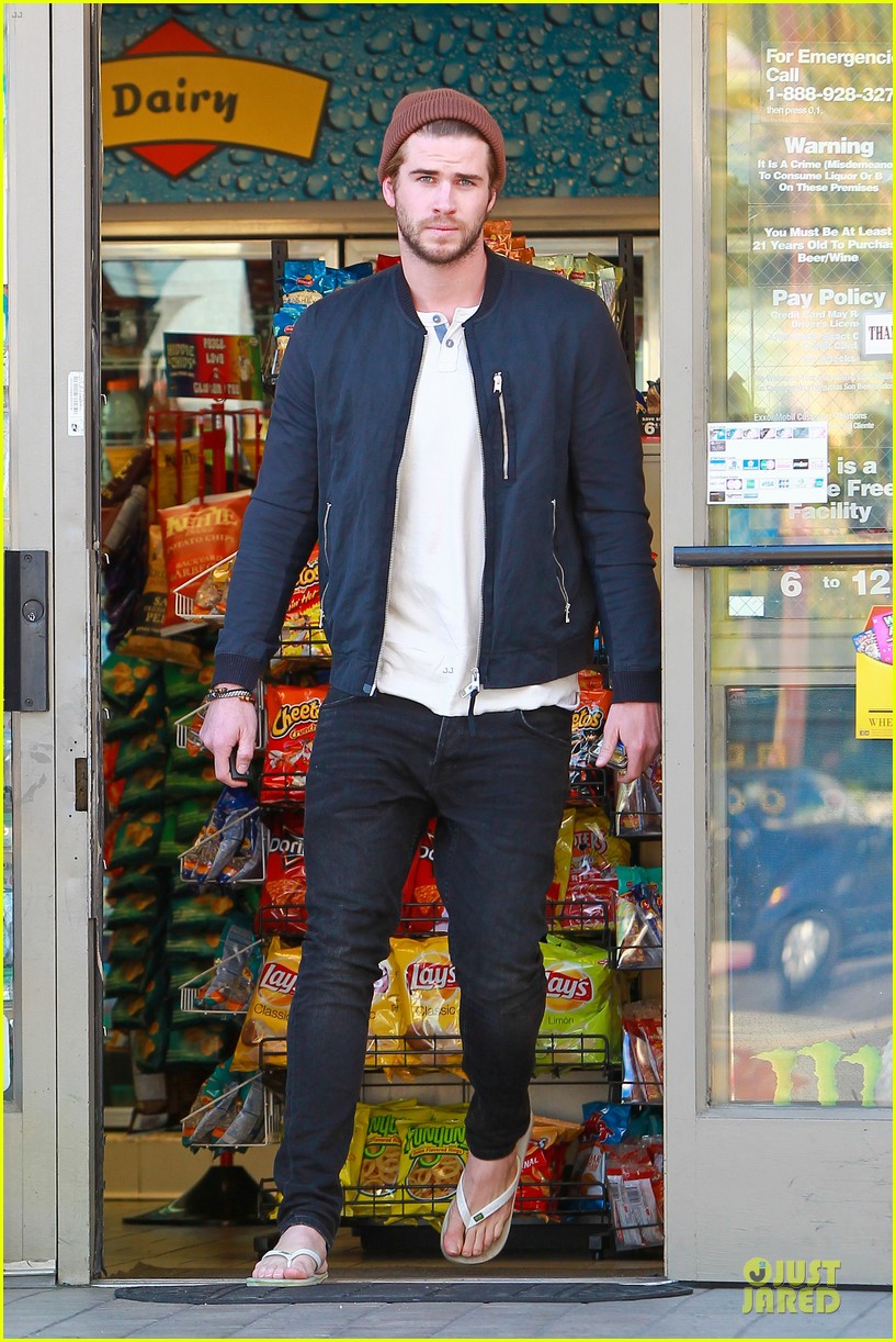 liam hemsworth steps out after catching fire breaks box office record 063000203