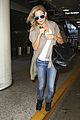 kate hudson flashes bra at the airport 01