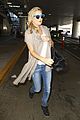 kate hudson flashes bra at the airport 06
