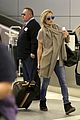 kate hudson flashes bra at the airport 17