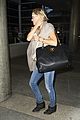 kate hudson flashes bra at the airport 21