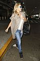 kate hudson flashes bra at the airport 22