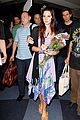 lana del rey receives flowers at lax airport 01