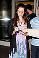 lana del rey receives flowers at lax airport 02