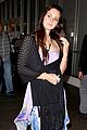 lana del rey receives flowers at lax airport 04