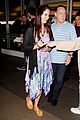 lana del rey receives flowers at lax airport 05