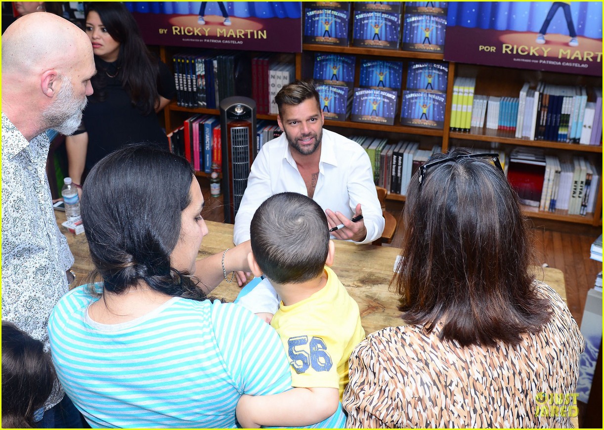 ricky martin flashes chest hair for santiago signing 05