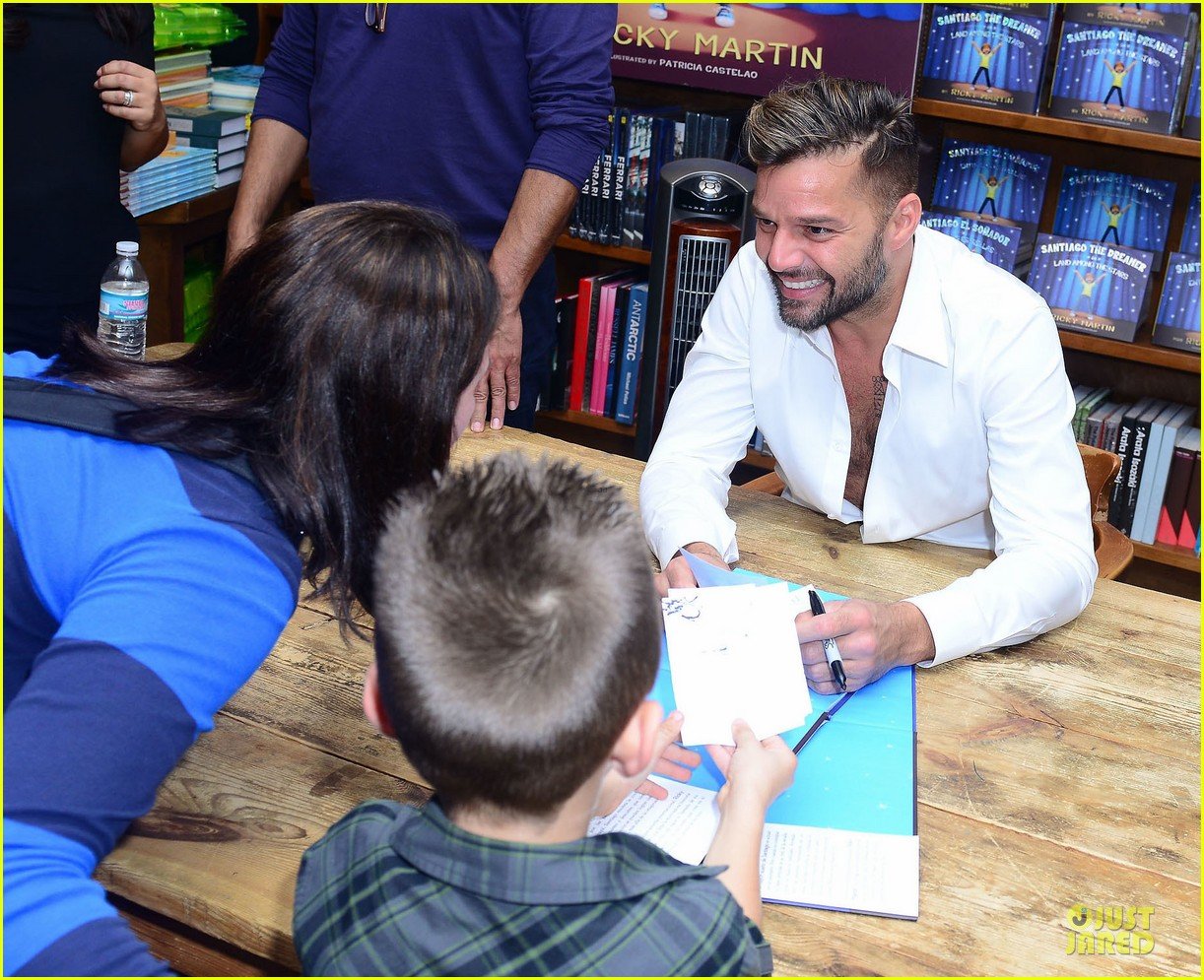ricky martin flashes chest hair for santiago signing 09