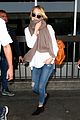 emma stone lands in lax airport after quiet few months 01