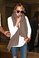 emma stone lands in lax airport after quiet few months 02