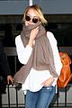 emma stone lands in lax airport after quiet few months 06