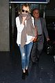 emma stone lands in lax airport after quiet few months 08