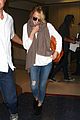 emma stone lands in lax airport after quiet few months 13