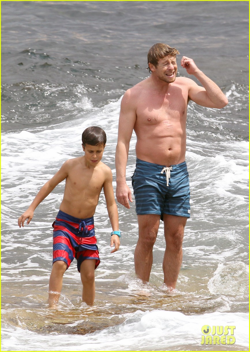 simon baker shirtless beach day with the family 103012325
