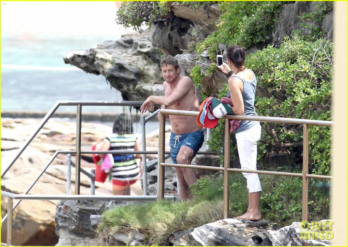 simon baker shirtless beach day with the family 213012336