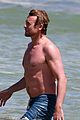 simon baker shirtless beach day with wife rebecca rigg 01