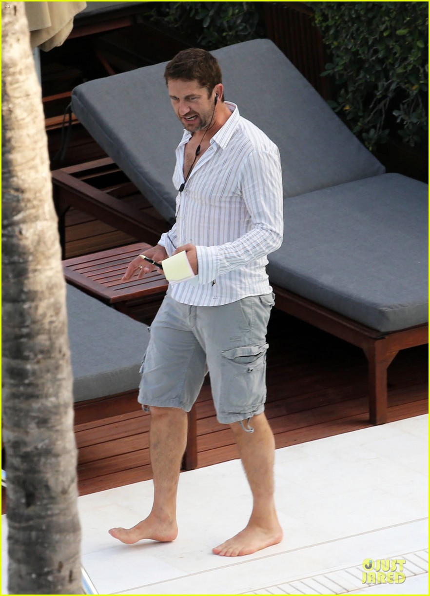 gerard butler relaxes at miami hotel pool with friends 133004336