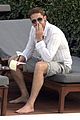 gerard butler relaxes at miami hotel pool with friends 12