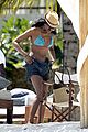 naomi campbell rocks a blue bikini at the beach in kenya 01