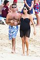 simon cowell shirtless beach stroll with pregnant girlfriend lauren silverman 07