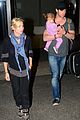 chris hemsworth carries india in his huge arms at lax 01