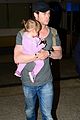 chris hemsworth carries india in his huge arms at lax 03
