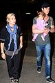 chris hemsworth carries india in his huge arms at lax 05