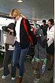 gwyneth paltrow chris martin lax arrival after christmas 04