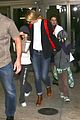 gwyneth paltrow chris martin lax arrival after christmas 06