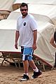 adam sandler spends relaxing beach day with wife jackie 03