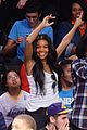 gabrielle union cheers on fiance dwyane wade at heat game 02