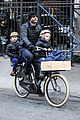 naomi watts takes subway while her boys bike to school 01