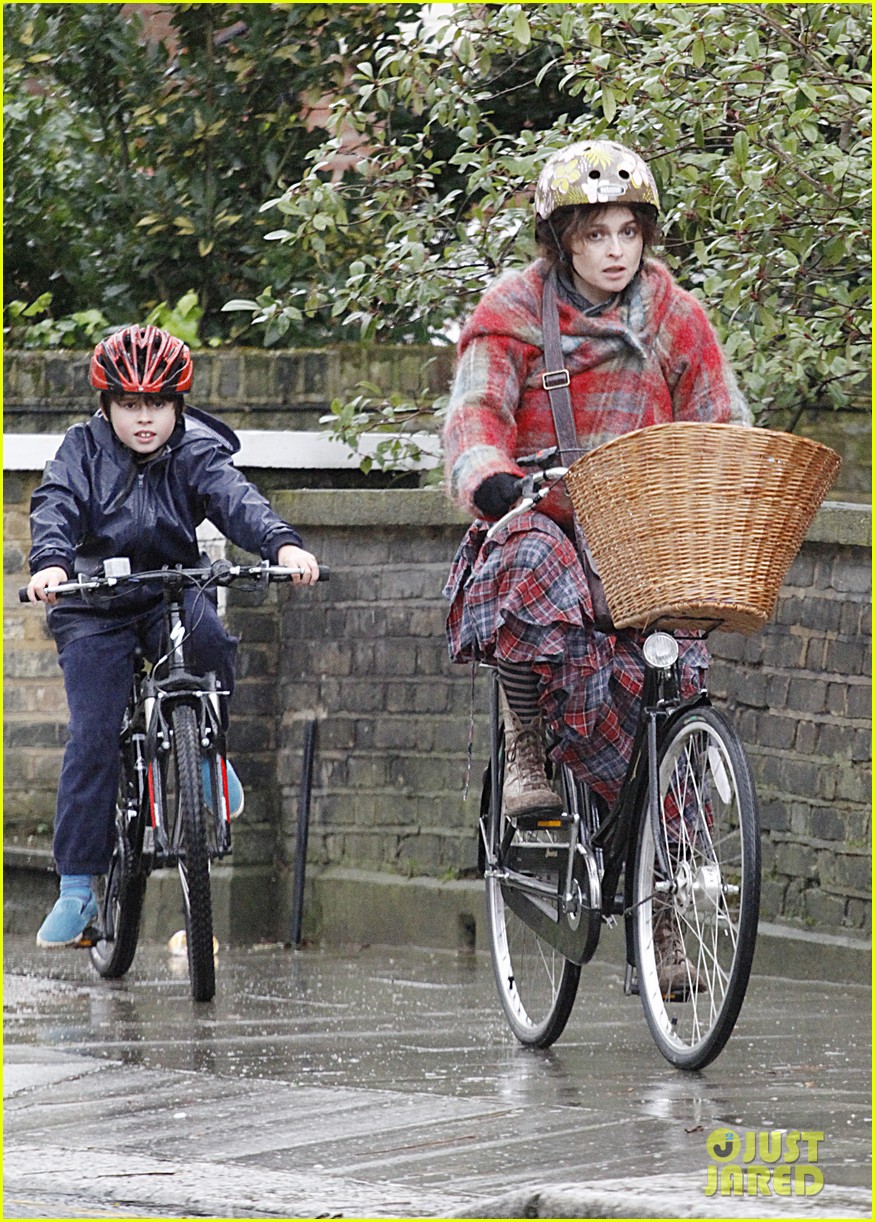 helena bonham carter bikes in the rain with son billy 03