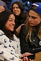cara delevingne michelle rodriguez go in for kiss at knicks game 03