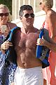 shirtless simon cowell draws large female crowd at the beach 02