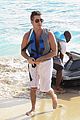 shirtless simon cowell draws large female crowd at the beach 05