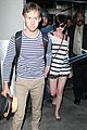 anne hathaway greets mob of fans at lax 04