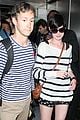 anne hathaway greets mob of fans at lax 21