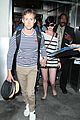anne hathaway greets mob of fans at lax 27