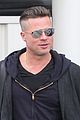 brad pitt touches down in sydney after awards weekend 04
