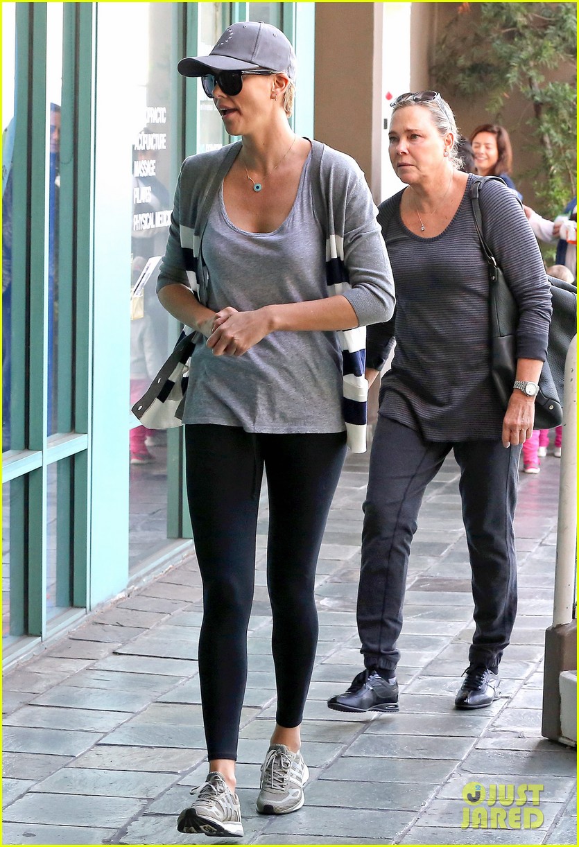 charlize theron takes caped crusader jackson to the gym 013025332