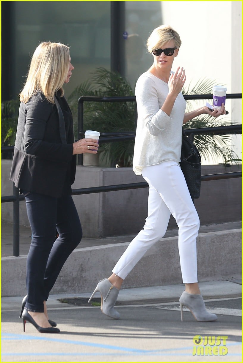 charlize theron vision in white for coffee run 01
