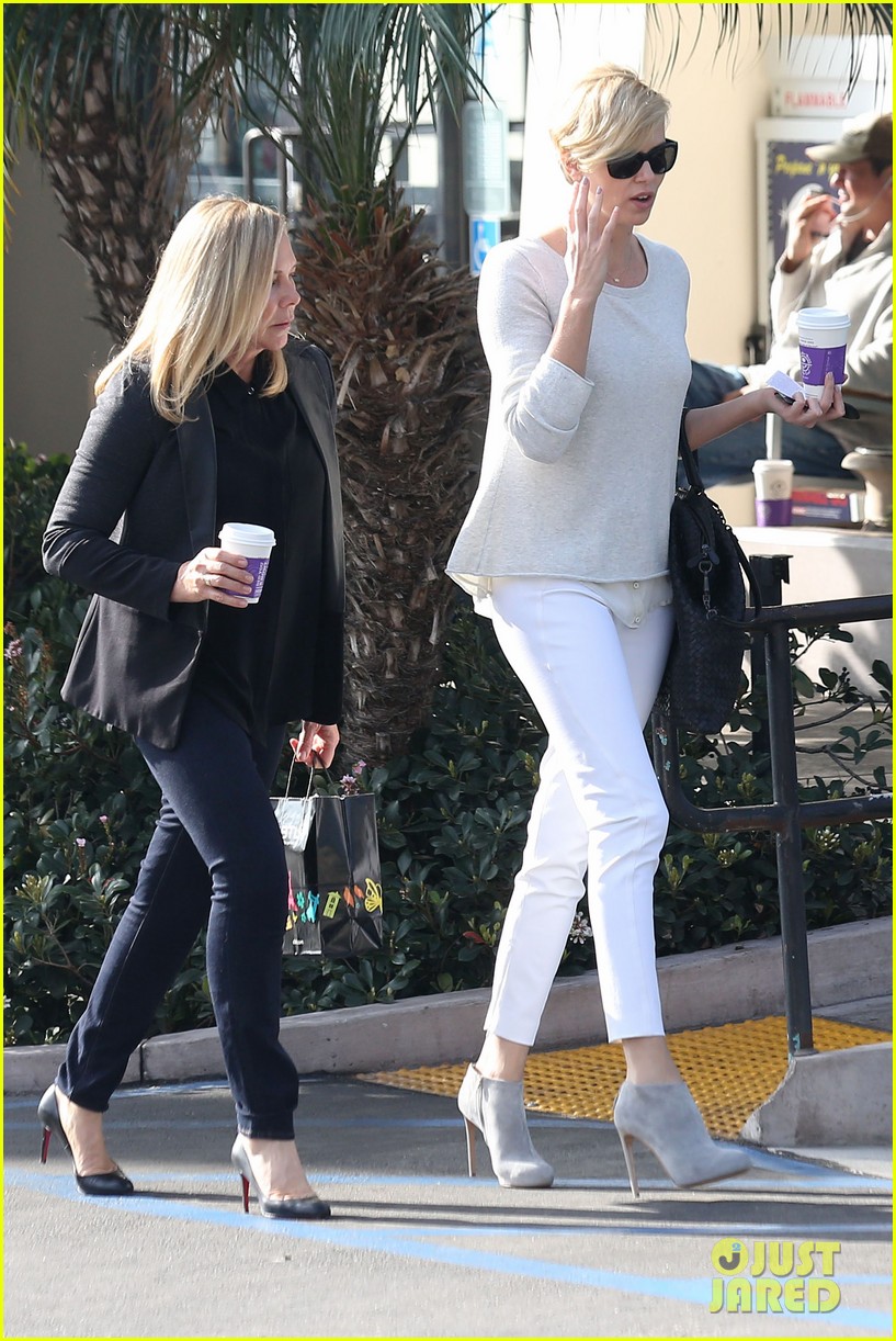 charlize theron vision in white for coffee run 08