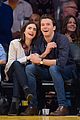 lily collins boyfriend thomas cocquerel hold hands at lakers game 02