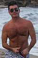 shirtless simon cowell tends to his cute pups on miami vacation 02