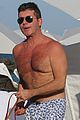 shirtless simon cowell tends to his cute pups on miami vacation 04