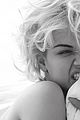 miley cyrus goes topless in bed for w magazine portfolio 02