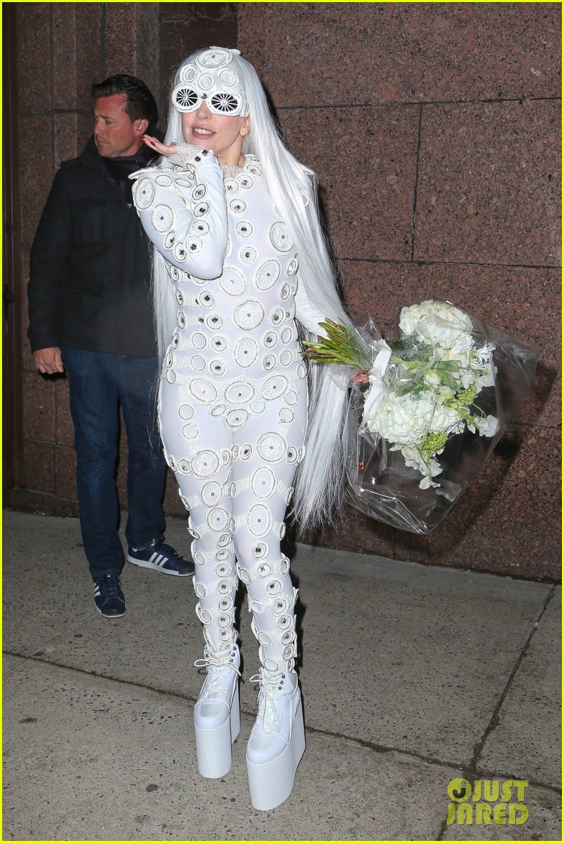 lady gaga is a bride see her throwing a bouquet of flowers 133057633