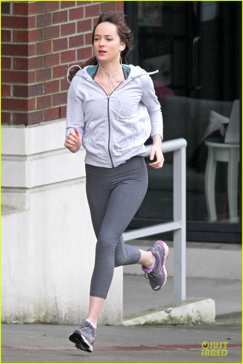 dakota johnson runs for fifty shades in pigtails 033053490